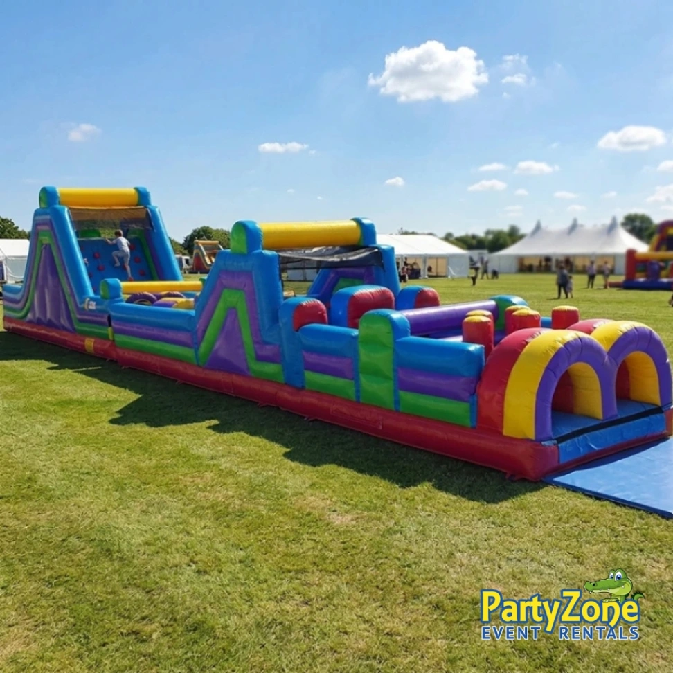 70ft Extreme dual-lane inflatable obstacle course rental for Kenner LA community events and carnivals
