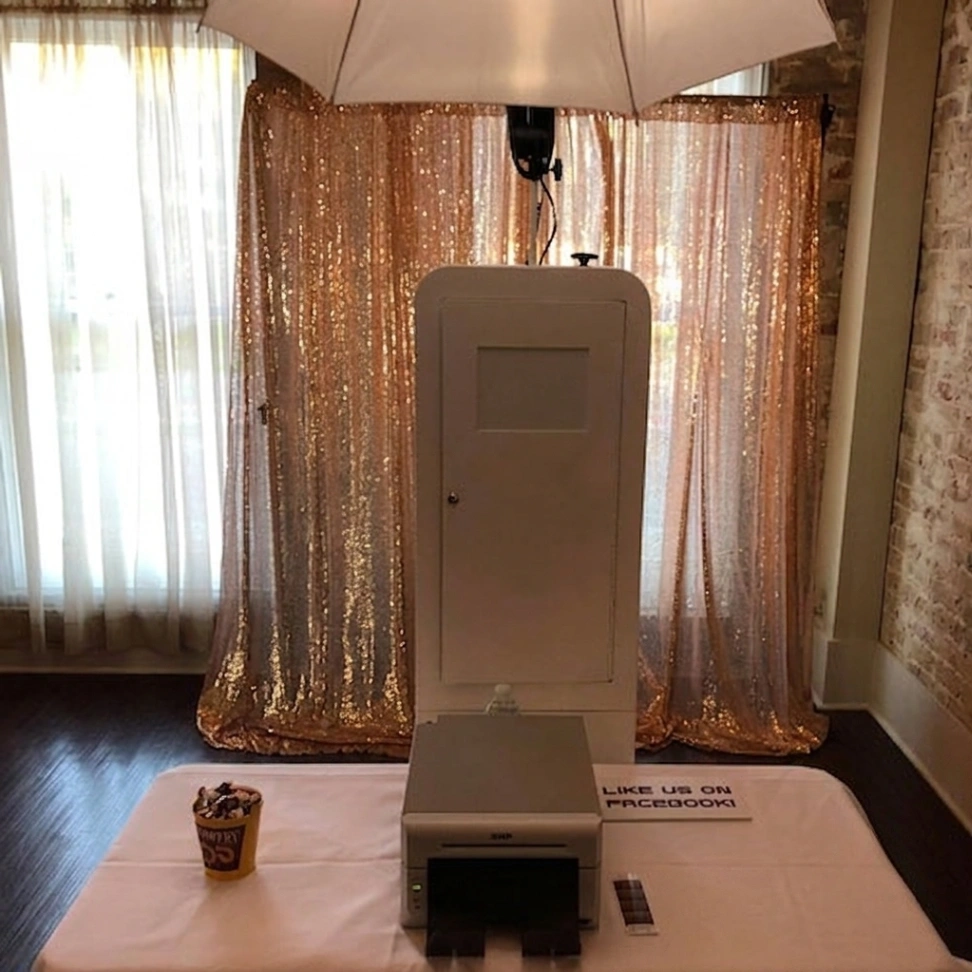 Platinum package photo booth rental for Kenner LA weddings and corporate events, prints and props